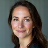 Professional headshot of Isabelle Schneider, News Writing Expert.